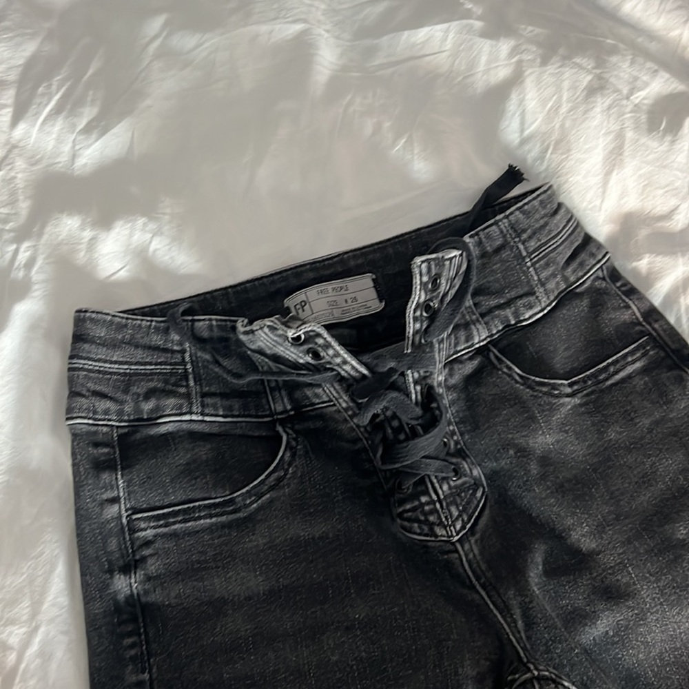 FREE PEOPLE black skinny jeans with lace up detail